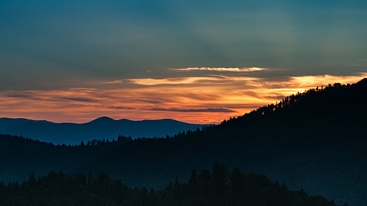 silhouette of mountain during sunset thumbnail
