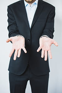 man wearing black suit jacket thumbnail