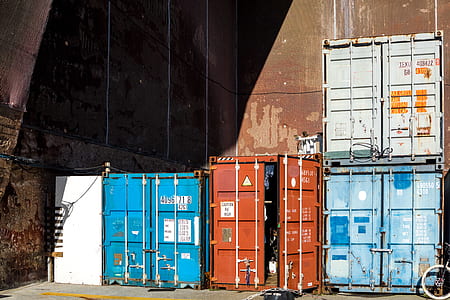four assorted-color intermodal containers thumbnail