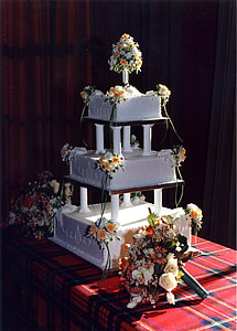 white icing-coated three tier cake thumbnail
