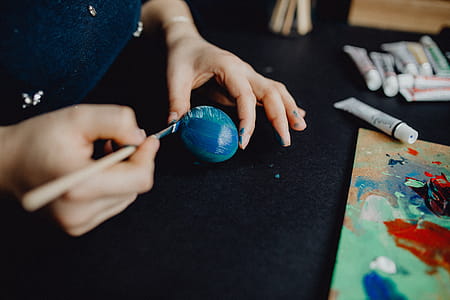 Woman Painting Easter Eggs thumbnail
