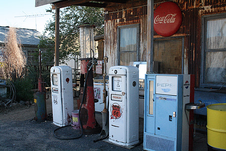white gas dispenser beside Pepsi vending machine thumbnail