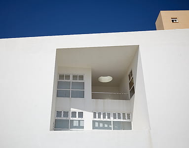 architectural photography of white building thumbnail