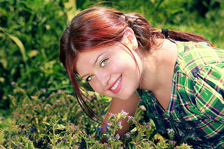 woman wearing green and black plaid top thumbnail
