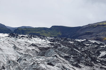 snow-covered mountain at daytime thumbnail