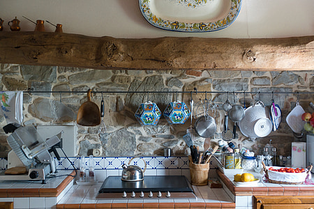 person taking photo of kettle on cooktop gas stove thumbnail
