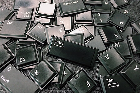 black computer keyboard keys on black surface thumbnail