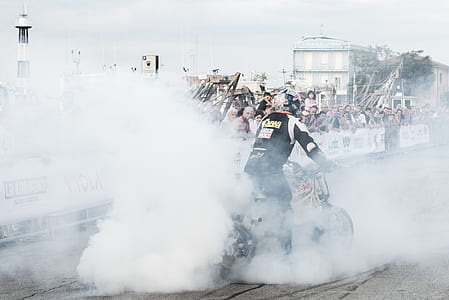 Man Riding Motorcycle With Smoke thumbnail