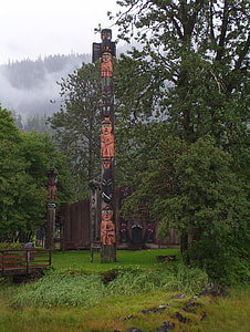 Totem poles at the Shakes house in Wrangell, Alaska thumbnail