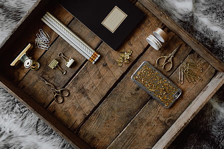 Office accessories on an old wooden tray thumbnail