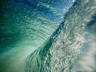 shallow photography of wave thumbnail