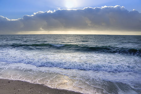 Ocean Under Blue Sky and White Clouds thumbnail