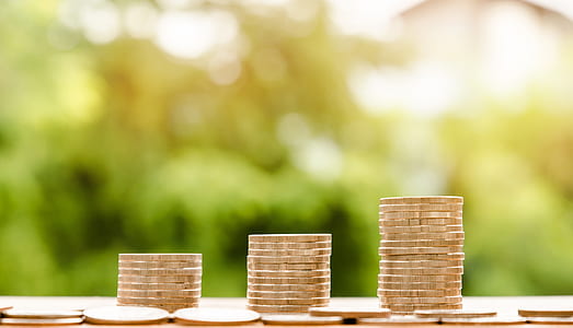 depth of field photography of stack of coins thumbnail