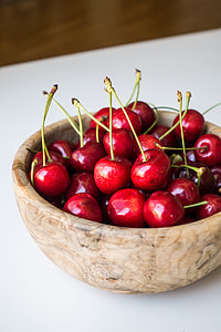 Fresh cherries in a wooden bowl thumbnail
