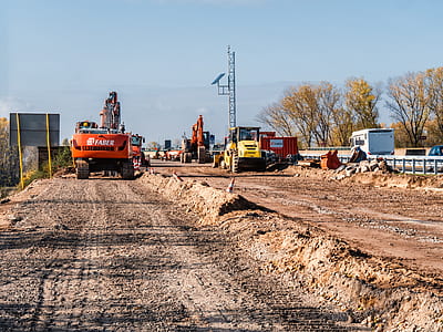 orange continuous truck on road thumbnail