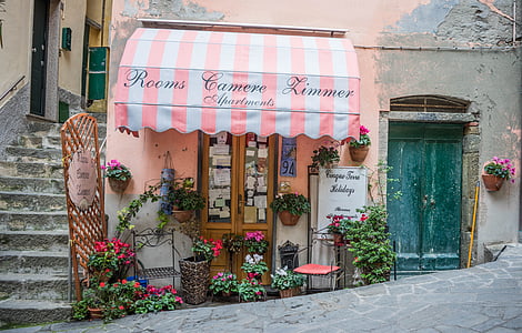 pink and white stripe awning with Rooms Camere Limmer text thumbnail
