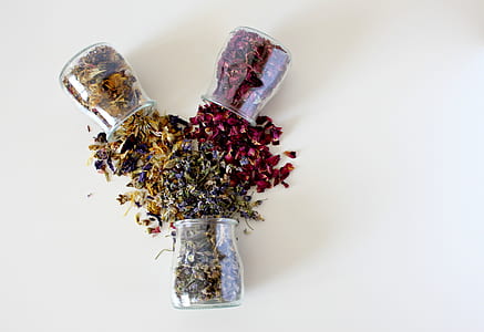 maroon, green, and yellow flowers on vases thumbnail