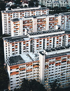 aerial view of white high-rise buildings during daytime thumbnail