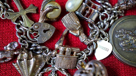 pile of silver-colored accessories thumbnail