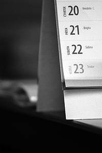 white desk calendar on wooden board thumbnail