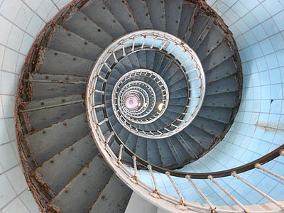 high angle photo of spiral staircase thumbnail
