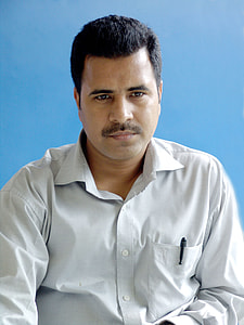 man in grey dress shirt thumbnail