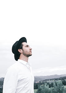 Man Looking at Sky at Daytime thumbnail