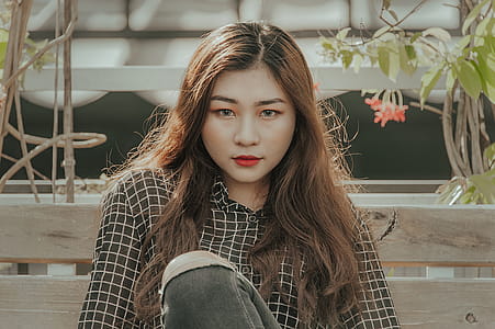 Woman Wearing Black and White Long-sleeved Shirt thumbnail