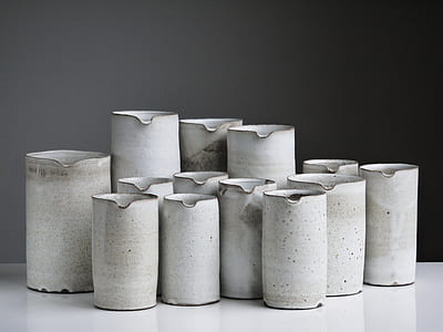 white ceramic vase and pitchers thumbnail