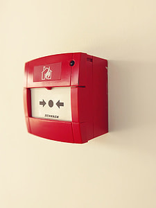 red and white emergency alarm on wall thumbnail