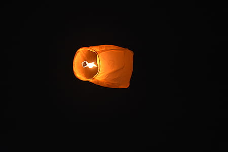 low-angle photography of sky lantern thumbnail