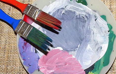 two red and blue paint brush on gray tray thumbnail