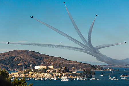 five flying aircraft with contrail under blue sky at daytime thumbnail
