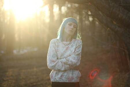 Photo of Woman Standing with Her Arms Crossed thumbnail