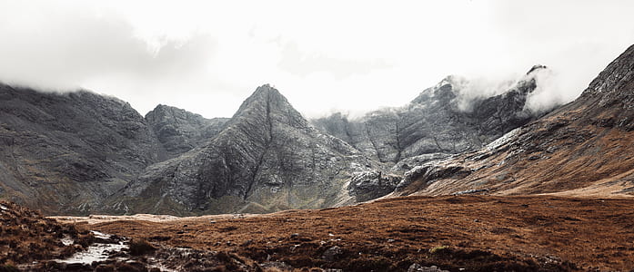gray mountain covered with clouds during daytime thumbnail