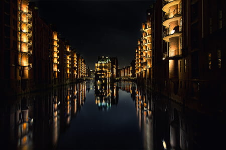 Reflection of Buildings on Water during Nighttime thumbnail