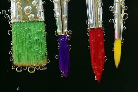 four assorted brushes thumbnail