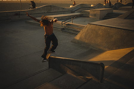 person using skateboard during daytime thumbnail