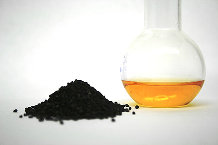 photo of clear glass vase and black powder thumbnail
