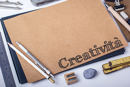 pencil, pen, sharpener, and eraser near papers thumbnail