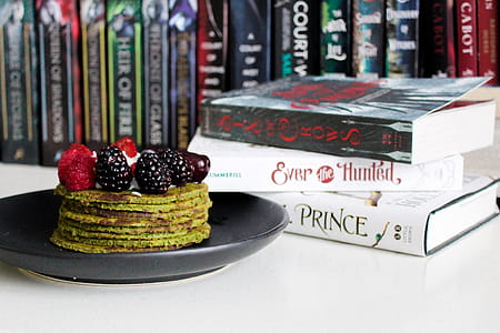 Books Near Cake on Plate thumbnail