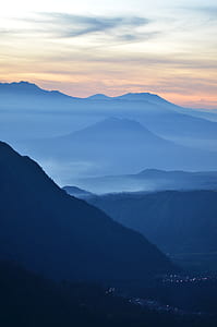 mountain hills covered with fogs thumbnail