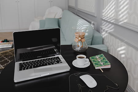 Workplace with laptop on table at home thumbnail