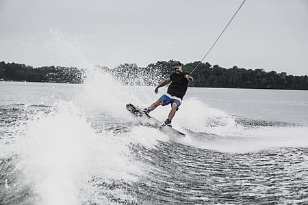 man wakeboarding during daytime thumbnail