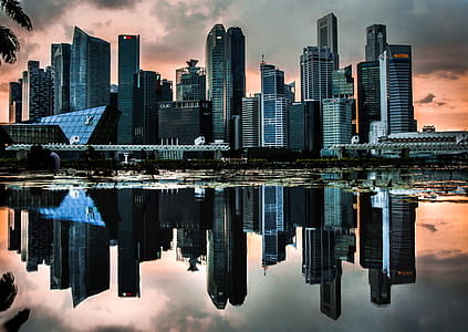 concrete structures near body of water thumbnail