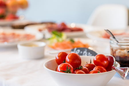 red tomato on white ceramic bowl thumbnail