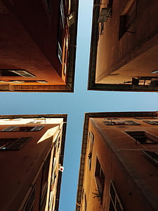 low-angle photography of brown buildings thumbnail