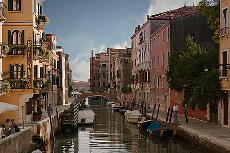 body of water in the middle of buildings thumbnail