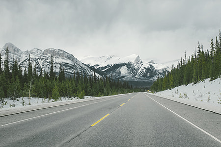 photo of asphalt road towards mountain alps thumbnail