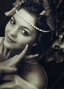 grayscale photo of woman wearing scoop-neck top and white pearls thumbnail